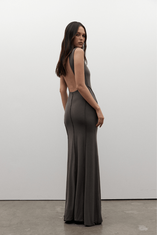 Mae Maxi Dress Smoke by Bayse – A sleek and trendy maxi with a high neckline and daring open back, flowing floor-length for chic evenings or special events.