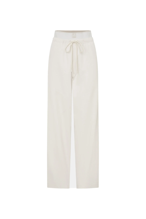Cella Monogram Elastic Pant White by Camilla and Marc, relaxed mid-rise pants with monogram waistband, slant pockets, and panel detailing.