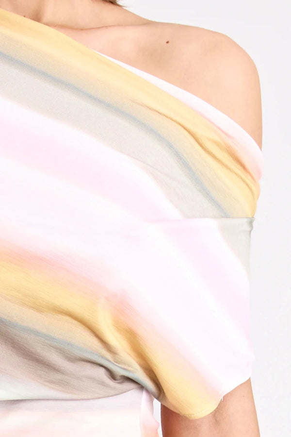 Elara Reversible Dress by Pfeiffer — peach printed mini dress with three-way reversible design and dramatic hem tie detail.