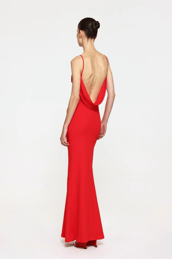 Havilland Gown Cherry Red by Effie Kats – A trendy, fitted gown with delicate ruching and a draped low back, crafted from stretch crepe for elegant special occasions.