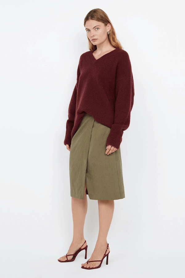 Campbell V Neck Jumper Plum by Bec + Bridge – Soft mohair blend knit with a flattering V neckline, ribbed collar and cuffs. Relaxed fit with dropped shoulders and pull-on style. Cold hand wash.