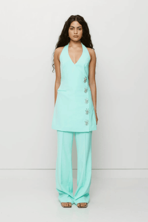 Inka Vest Dress Aqua by The Wolf Gang, a tailored mini with halter neckline and custom hardware. Perfect for bold day-to-night dressing.