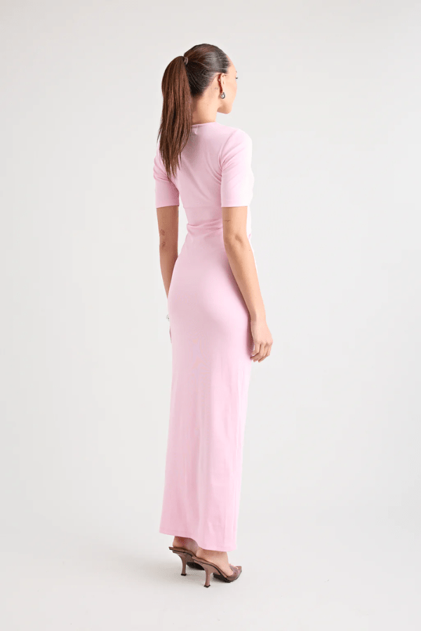 Florence Dress Pink by Pfeiffer – A trendy fitted maxi with cut-out hardware accents, crafted from soft cotton-spandex. Perfect for chic, ethical day-to-night wear. Made in Australia with care.