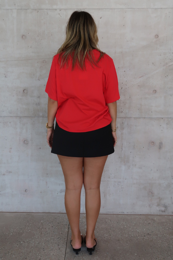 Sneaky Mini Skirt Black by Sneaky Link – A-line high-waisted mini with boned waist and flap pockets, perfect for day-to-night styling.