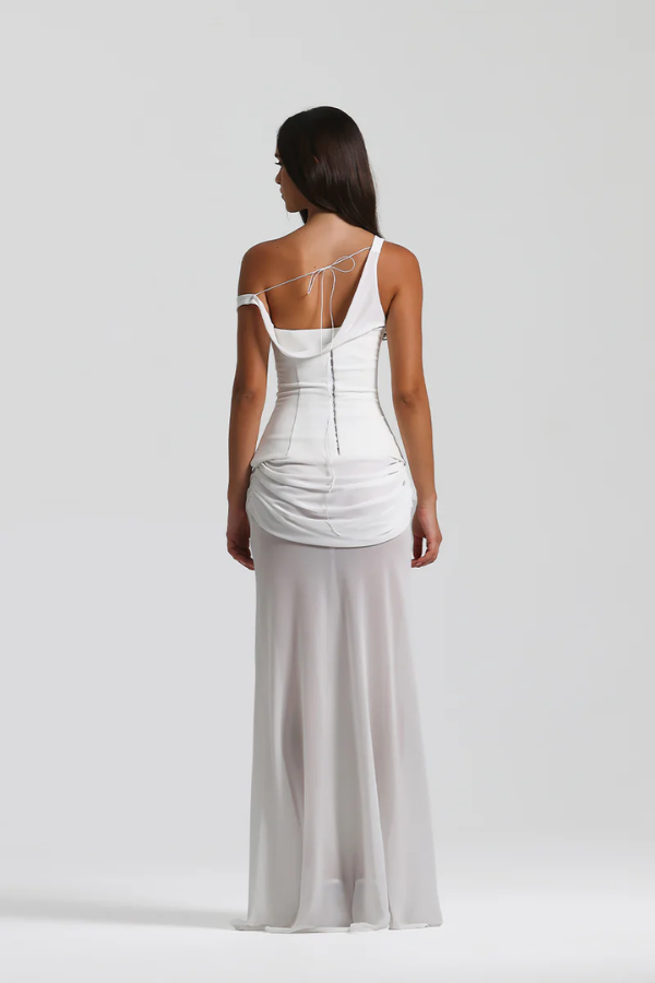 Cadence Dress White by Natalie Rolt, featuring a bias-cut georgette silhouette, off-shoulder detail, removable corset, and gathered skirt, offering both structured and relaxed styling options.