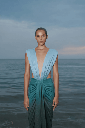 Nia Dress Dark Lime by Baobab – A bold maxi with a deep V-neck, open back, and shiny ruched fabric, perfect for making a viral statement at special events.