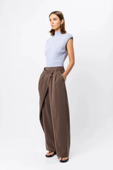 Quiet Force Top by Mossman in sky blue, ribbed sleeveless turtleneck with removable shoulder pads for sleek everyday styling.
