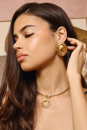 Hot In Here Gold by Emma Pills - gold statement earrings with hammered texture and hollow design, designed for a bold lightweight look.