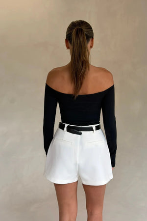 Black Henley long sleeve bodysuit with an off-shoulder neckline and fitted silhouette.