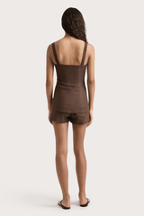 Corbiere Vest Bistre by Faithfull the Brand, sophisticated 100% European Flax® linen vest with wide straps, straight neckline, and mock buttons, perfect for trendy viral layering and elegant summer looks.