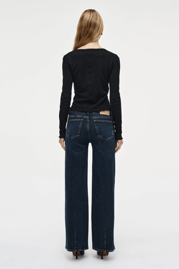 Eva Wide Memphis by Summi Summi, trendy mid-rise pants with a flattering A-line, wide-leg fit. Perfect for effortless movement and elongating the frame with signature repair stitch and fob ring detailing.