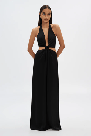 The Wander Satin Gown Black by Misha – A timeless, elegant maxi gown in lightweight satin with a flattering twisted front detail, perfect for warm evening events.