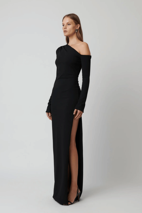 Effie Kats Cayley Gown, an off-shoulder stretch crepe gown with a sleek silhouette and side split for timeless evening elegance.
