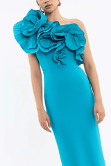 Ella Gown Blue by Rebecca Vallance – Crepe one-shoulder gown with applique neckline, cinched waist, back split, side zip.