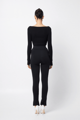 Camden Top Black by Mossman, soft double-layered ribbed jersey with boat neckline and thumb sleeves, perfect for trendy layering and chic day-to-night wear.