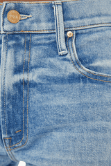 Mid Rise Maven Sneak Peak A Boo by Mother Denim, mid-rise relaxed wide-leg jeans with distressed knees, light-blue wash, perfect for casual cool style.