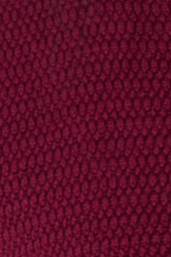 Helena Skirt – Plum by Onte, a cotton crochet mini with elastic waist. Perfect for pairing with the matching gilet or worn on its own.