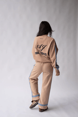 Maya Knit Pant Nougat by Araminta James, soft cotton knit pants with contrast trims and split hems, perfect for chic, comfortable leisurewear looks.