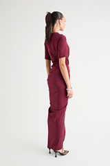 Niko Maxi Dress Burgundy by Pfeiffer – Trendy relaxed T-shirt maxi with adjustable side ruching, crew neck, and breathable cotton blend, perfect for elevated off-duty style and everyday comfort.