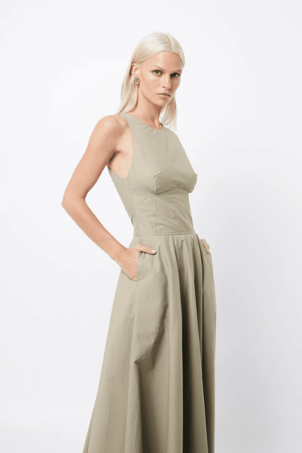 Homage Maxi Dress Eucalyptus by Mossman – A trendy, breathable cotton maxi with a flattering A-line flare and sleek design, perfect for stylish warm-weather days.
