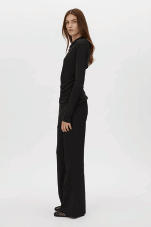Mai Long Sleeve Top Black by Camilla and Marc – asymmetric twisted neckline with side tucks and sleek lining, perfect for elegant nights or polished day looks.