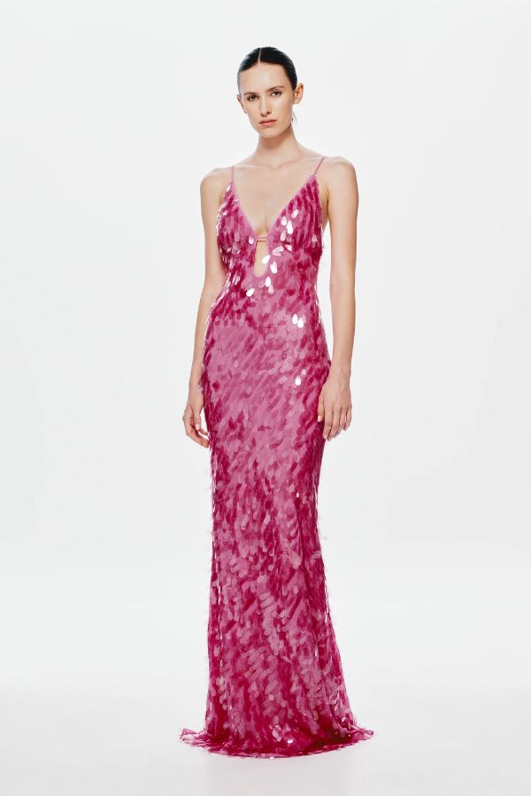 Sapphire Sequin Maxi Dress by Misha, a fuchsia pink gown with plunging cut-out neckline, low back, and voluminous hem. Perfect for events.

