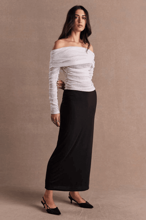 Emara Sleeveless Mini Dress Black by Sovere – fitted mini dress with pleats, keyhole neckline, tie details, and back zipper.