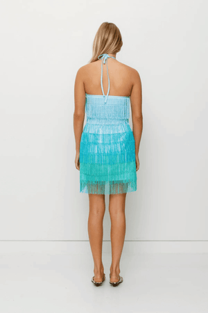 Wilde Fringe Mini Dress Black by The Wolf Gang, a dramatic zig-zag fringe mini with asymmetrical hem. Perfect for cocktails or festival nights.