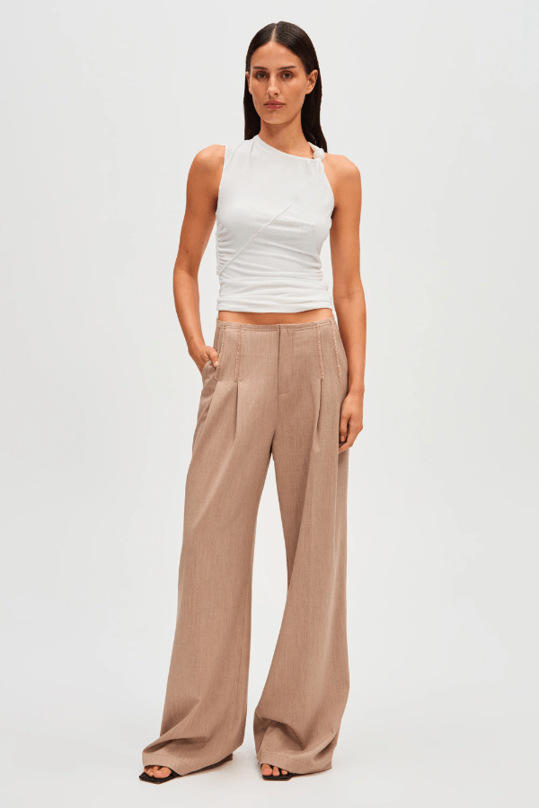 Simone Pant taupe by Misha, wide-leg pants with trendy frayed details and front pleats, perfect for casual or formal wear with a relaxed fit.