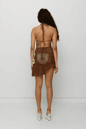 Elke Crochet Mini Dress Cocoa by The Wolf Gang, handwoven with floral crochet detail, perfect over swimwear for luxe summer layering.