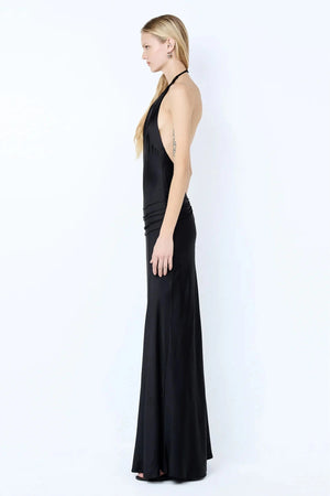 Quentin Racer Maxi Dress by Bec + Bridge, a sleek backless halter with rouleau trim and bias-cut skirt. Perfect for elegant evenings.
