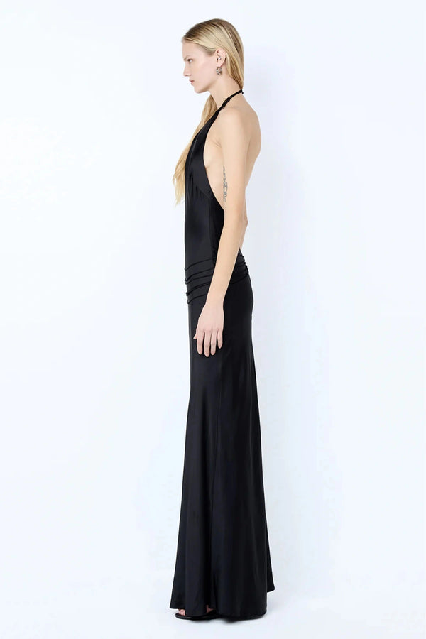 Quentin Racer Maxi Dress by Bec + Bridge, a sleek backless halter with rouleau trim and bias-cut skirt. Perfect for elegant evenings.