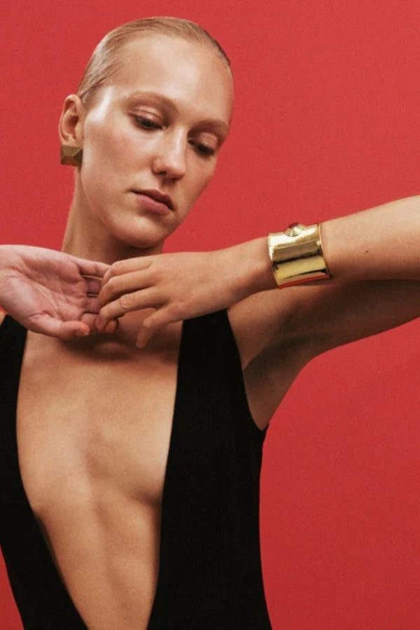 Matilde Cuff by Heaven Mayhem – a gold architectural cuff with deep burgundy enamel, perfect for bold refined styling.