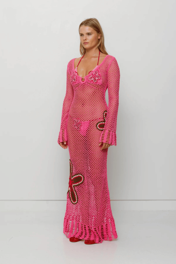 Elke Crochet Maxi Dress Candy by The Wolf Gang, handwoven with floral crochet in a relaxed silhouette. Perfect layered over swimwear this summer.