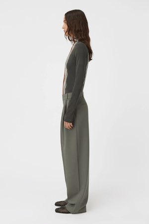 Annick Pant Sacramento Green by Camilla and Marc, double-pleated with a mid-low waist and pressed creases, perfect for modern tailoring or chic office dressing.
