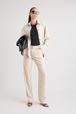 Pino Trouser natural by Pfeiffer, mid-rise tailored pants with front pleats and side pockets, perfect for day-to-night wear and office to evening events.