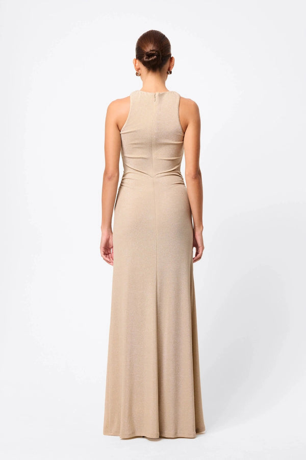 Adore You Maxi Dress by Mossman, a metallic jersey racer maxi with twist waist and fluid skirt that shimmers for weddings or evening events. 