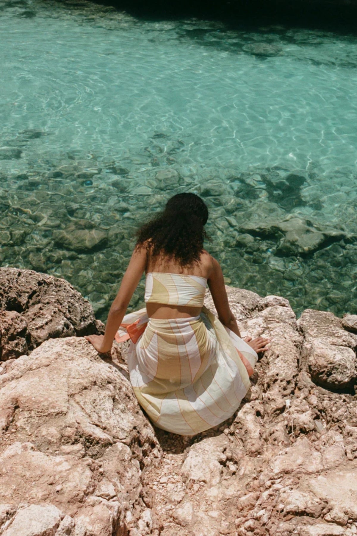 Square Pareo in Essence by Soleil Soleil, a lightweight organic cotton wrap or scarf with paisley-inspired colour-block print, perfect for sun-drenched days.