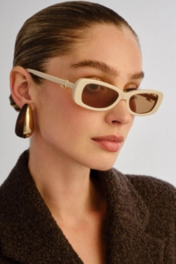 Bella Beige Sunglasses by Luv Lou – a slim rectangular frame with khaki brown lenses and gold hardware. Perfect for timeless everyday wear.
