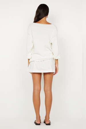 Dante Mini Skirt in Ivory by Bec + Bridge, stretch nylon mini with drawstring waist and gathered finish. Perfect for easy everyday styling.