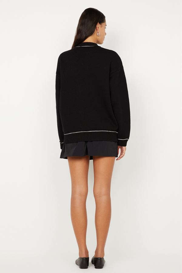 Dante Mini Skirt in Black by Bec + Bridge, a gathered stretch mini with drawstring waist. Perfect for relaxed everyday styling.