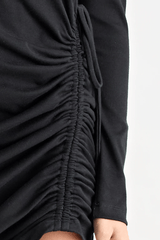Rule Eight Dress Black by Pfeiffer – A trendy and versatile cotton mini dress with adjustable side ruching, crew neckline, and full sleeves. Perfect for stylish day-to-night wear.