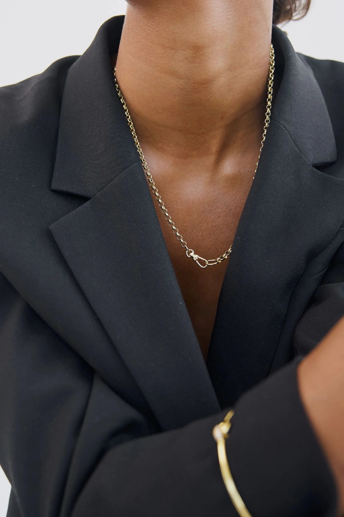 Puff Heart Necklace in Silver by Avant Studio, a silver belcher chain with detachable gold clasp and heart charm. Perfect layered or worn solo.