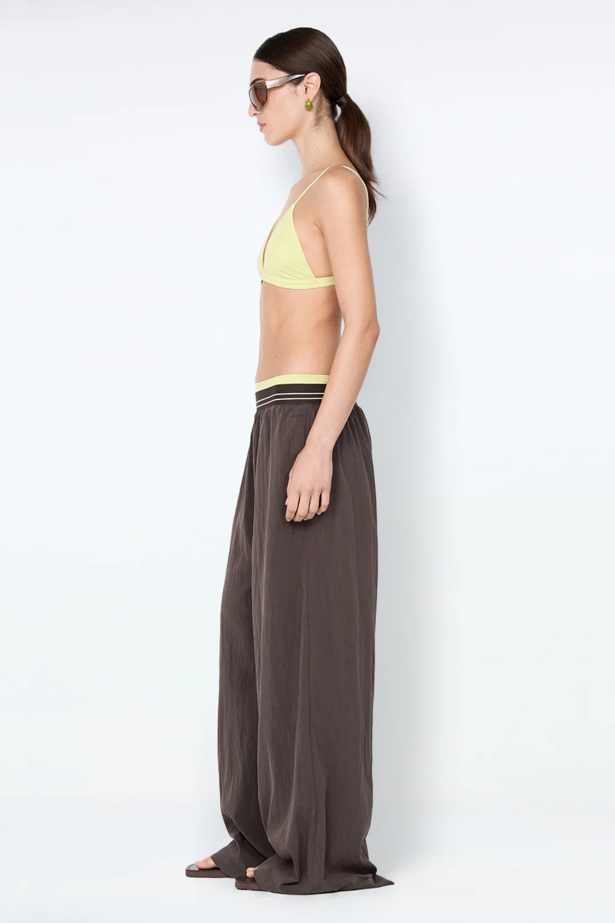 Jerri Wide Leg Pant by Bec + Bridge, a lightweight nylon pant with elastic waistband and wide-leg silhouette for effortless, relaxed sophistication.