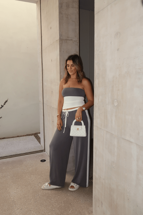 Hunter Tube Top Steel/Ivory by Sneaky Link – Sleek strapless top with contrast neckline and ruched sides. Perfect for trendy coordinated looks and viral summer vibes.