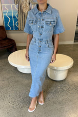 Katrina Denim Midi Dress in Light Blue Wash by Sneaky Link, stretch denim dress with cinched waist and button-up front.