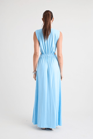 Do For Love Gown Light Blue by Pfeiffer – A trendy, elegant maxi with a deep plunge, thigh-high split, and bold hardware, perfect for special occasions and evening events.
