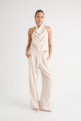 Pino Cowl Top Natural by Pfeiffer – Trendy, soft suiting top with adjustable cowl neckline and cinched back, perfect for chic day-to-night elegance.