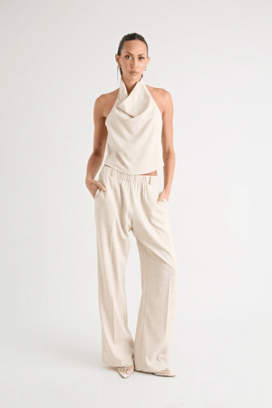 Pino Cowl Top Natural by Pfeiffer – Trendy, soft suiting top with adjustable cowl neckline and cinched back, perfect for chic day-to-night elegance.