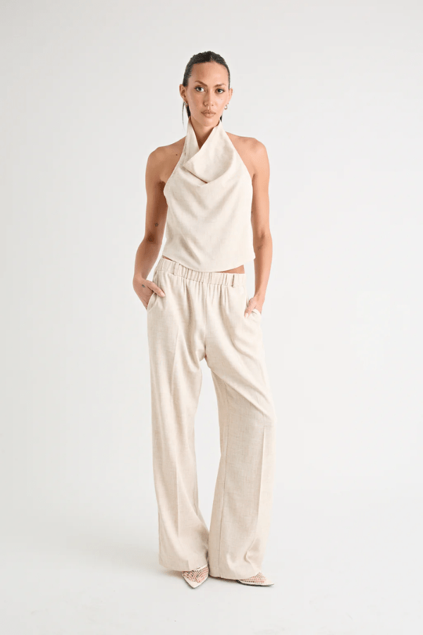 Pino Cowl Top Natural by Pfeiffer – Trendy, soft suiting top with adjustable cowl neckline and cinched back, perfect for chic day-to-night elegance.